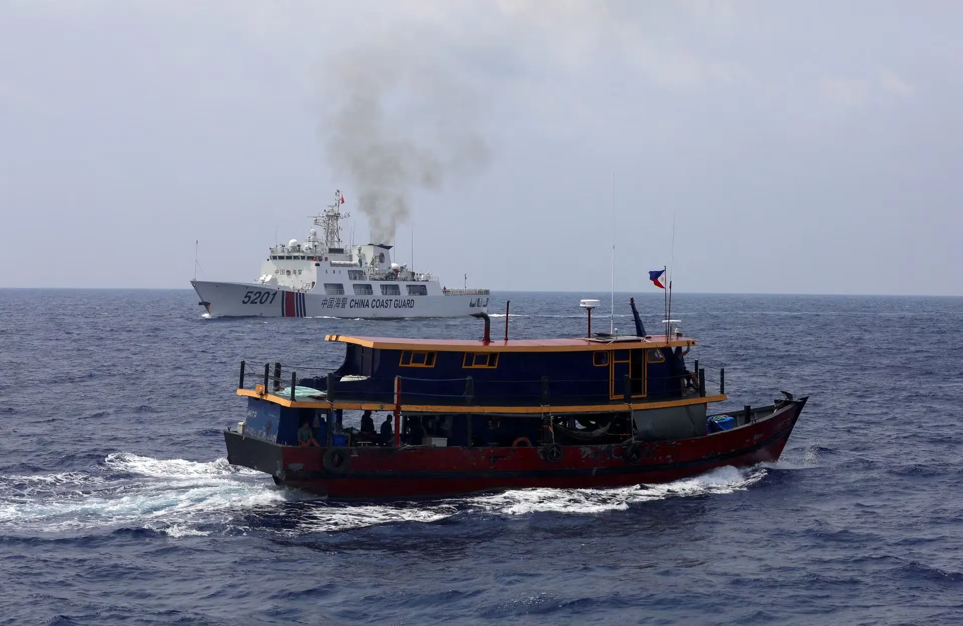 Chinas military conducts South China sea patrols amid rising tensions