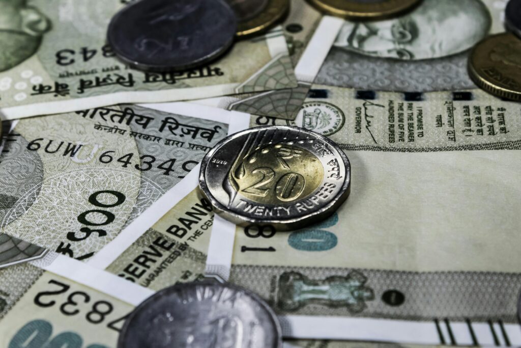 Rupee hits 90.58 low on US trade deal delay; near-term pain expected